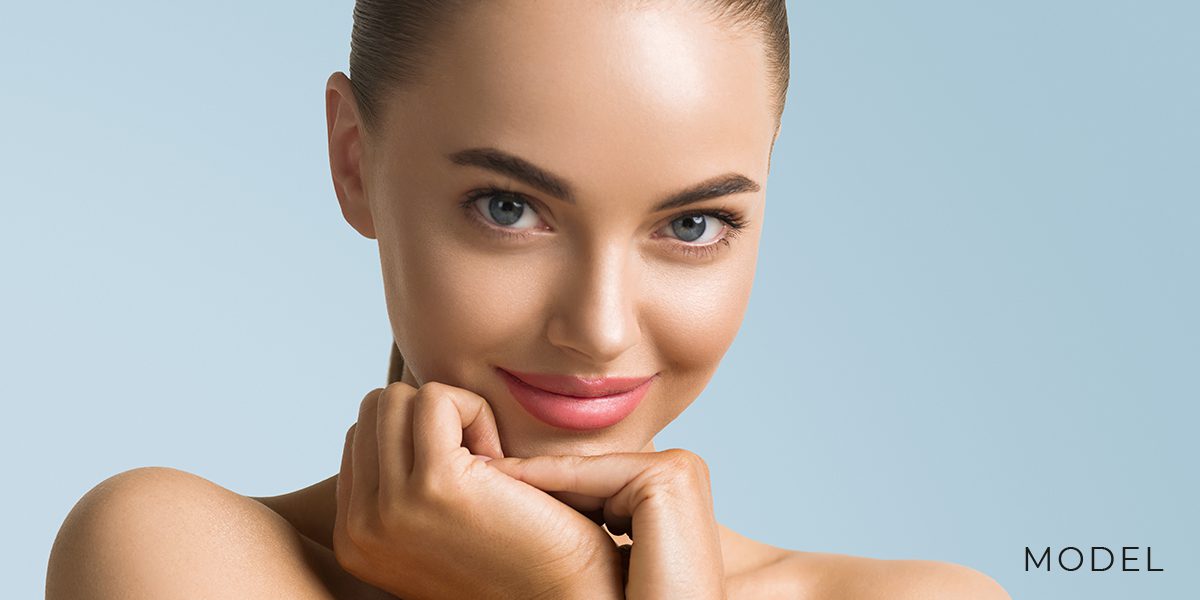 Close Up of Young Female with Smooth and Bright Facial Skin