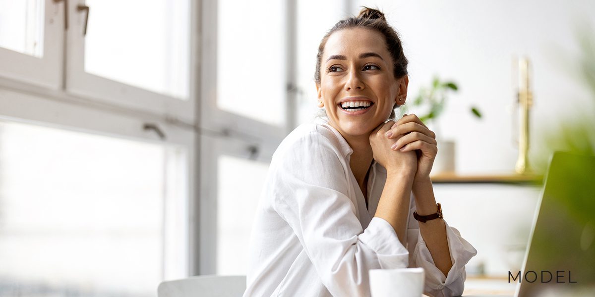 Young Female Researching Surgical and Financing FAQs